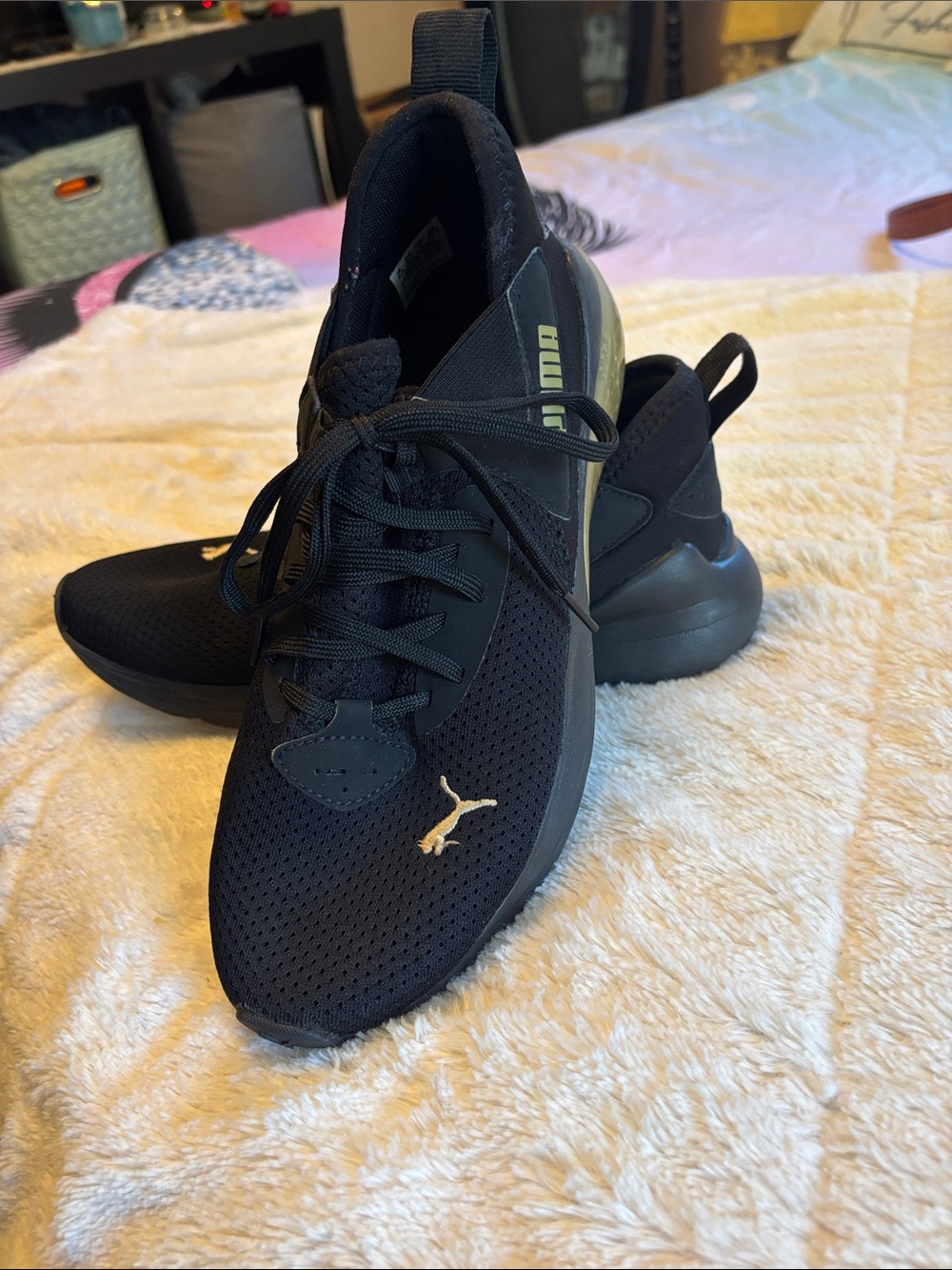 Puma Black Sneakers with Gold Logo Accent